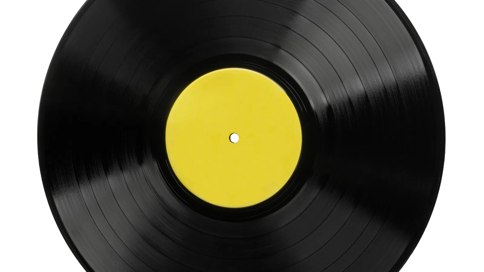 A 12-inch vinyl LP photographed edge-on, showing its thickness
