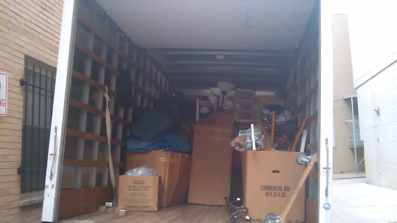Stacked cardboard shipping boxes used for packaging and postage